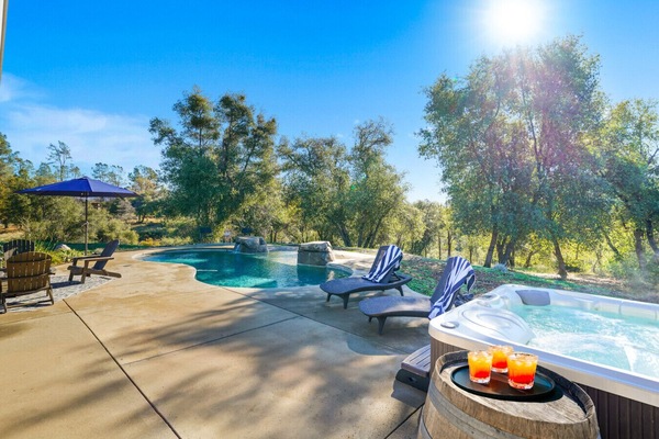 From morning dips to starlit hot tub soaks, this backyard oasis is made for rest and play.