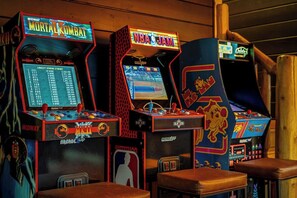 Games room - NEW! Stunning 4BR Cabin w/Hot Tub, Fire Pit, Pool Table, Arcades & Pool Access (Sevierville)