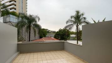 Deluxe Apartment, Balcony, Garden View | Property grounds