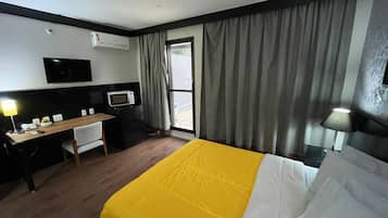 Deluxe Apartment, Balcony, Garden View | In-room safe, blackout drapes, iron/ironing board, free WiFi