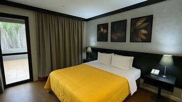 Deluxe Apartment, Balcony, Garden View | In-room safe, blackout drapes, iron/ironing board, free WiFi