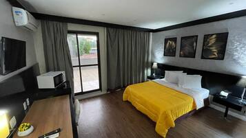 Deluxe Apartment, Balcony, Garden View | In-room safe, blackout drapes, iron/ironing board, free WiFi