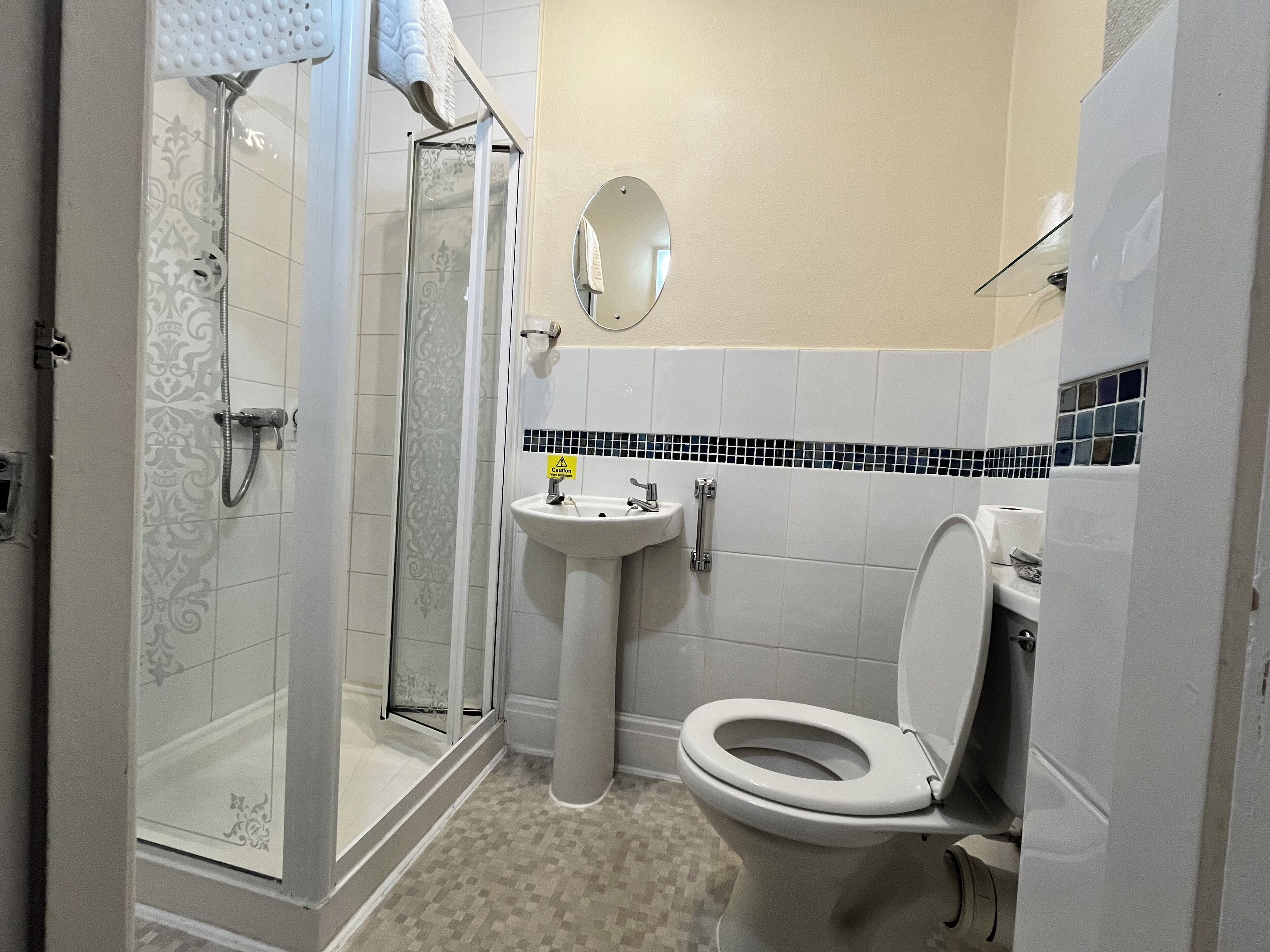 Shower, free toiletries, hair dryer, towels