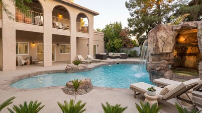 Family Fun Oasis with Pool, BBQ & Game Room 9-bedroom house with AC in Las Vegas