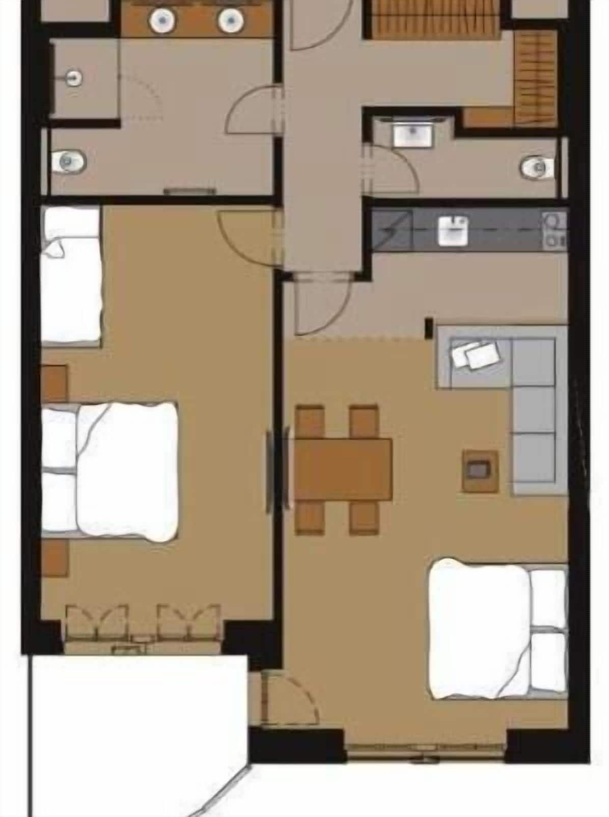 Un plan d’aménagement de chambre d’hôtel comprenant un lit, un bureau, un canapé et une petite table.
