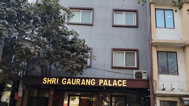 A building with a sign reading "SHRI GAURANG PALACE". - S. G. P Dormitory (Mathura)