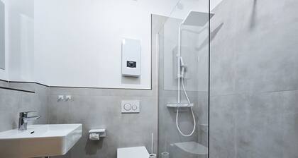 Alpha Apartments: Comfy & Modern | 2BR, 4 Beds