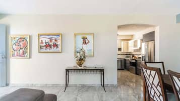 Superior Apartment | Living area | 32-inch flat-screen TV with digital channels