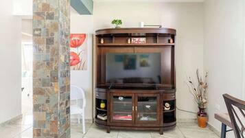 Superior Apartment | Living area | 32-inch flat-screen TV with digital channels