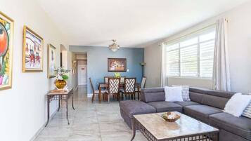 Superior Apartment | Living area | 32-inch flat-screen TV with digital channels