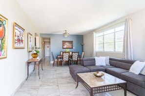 Townhome | Living area | 32-inch flat-screen TV with digital channels