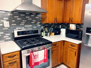 Microwave, oven, stovetop, dishwasher - 3-Bedroom Ranch with a finished basement in scenic Pittsburgh neighborhood! (Pittsburgh)