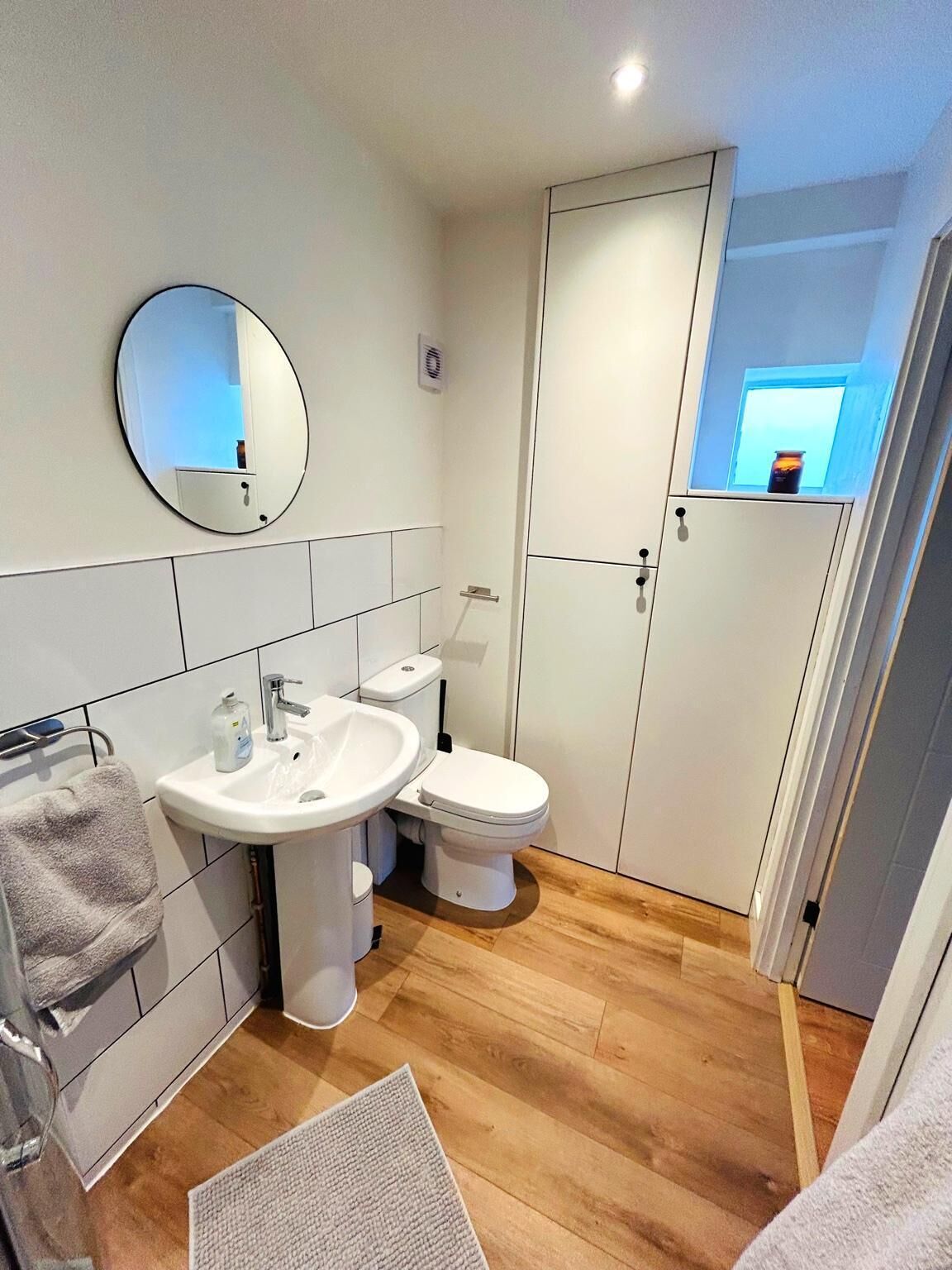 Shower, hair dryer, towels, toilet paper