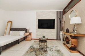 1 habitación, tabla de planchar con plancha, wifi y ropa de cama 