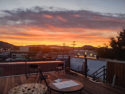 Creative Industrial Retreat with Decks, Games, Hot Tub & Spray Paint Trailer