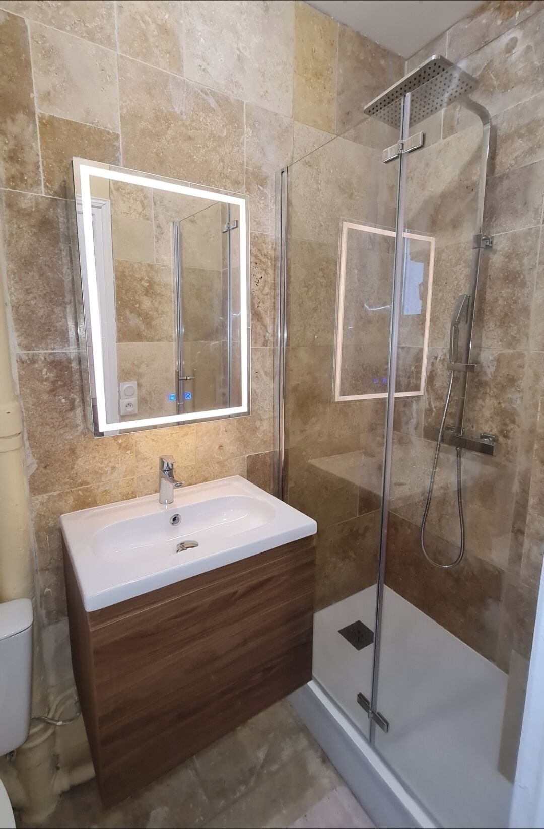 Shower, hair dryer, towels, toilet paper