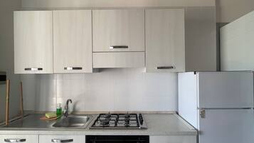 Family House, Sea View | Private kitchen | Fridge, high chair