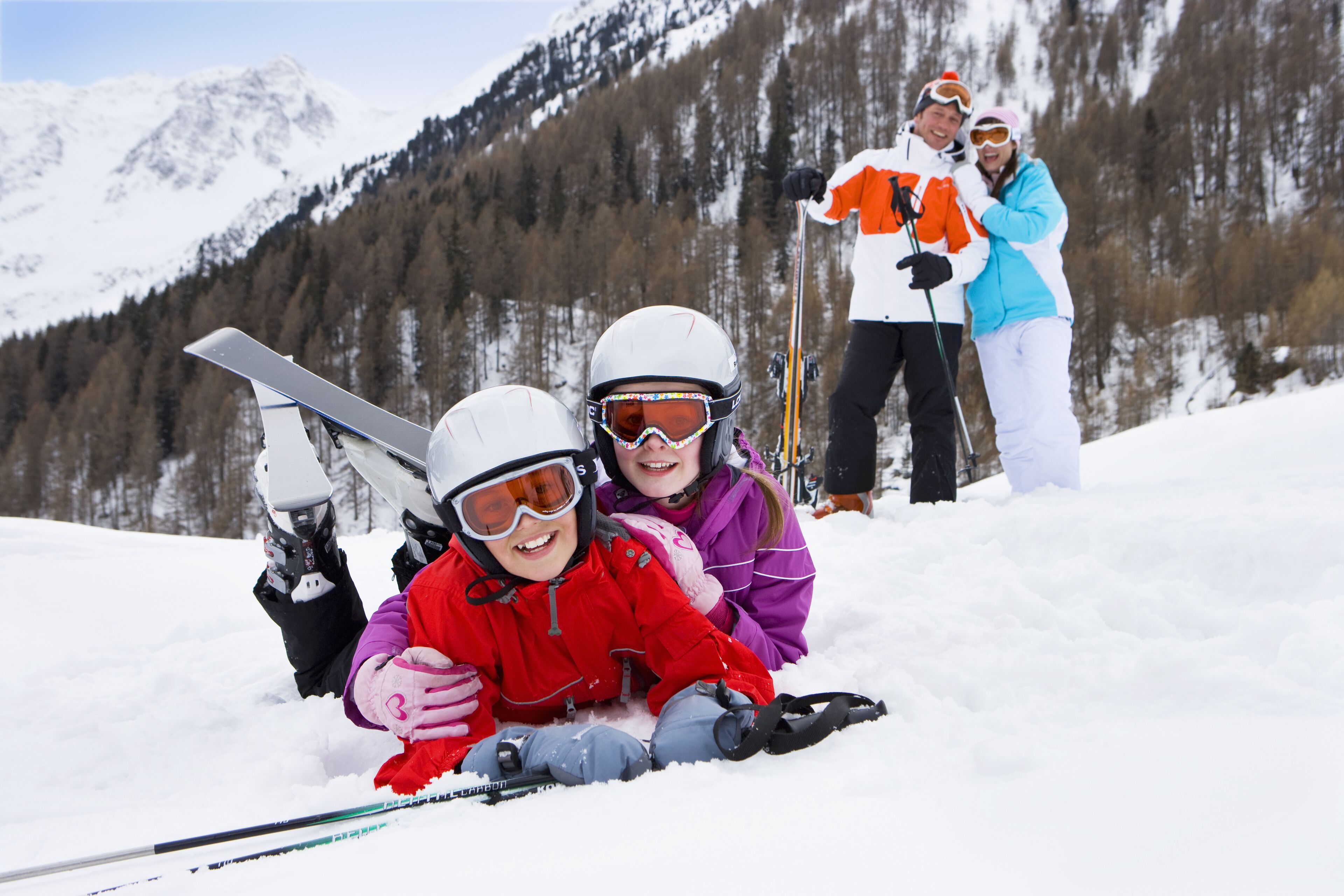 A snowy mountain landscape with a ski slope.