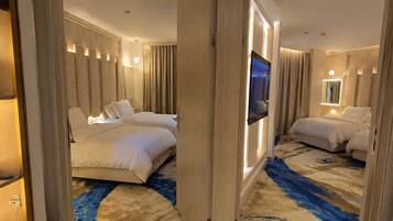 Premium bedding, down duvets, minibar, in-room safe
