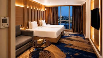 Deluxe Queen Suite | Roupas de cama premium, edredons de pluma, frigobar, cofres nos quartos