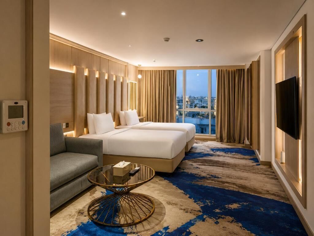 Ropa de cama de alta calidad, cubrecamas y minibar 