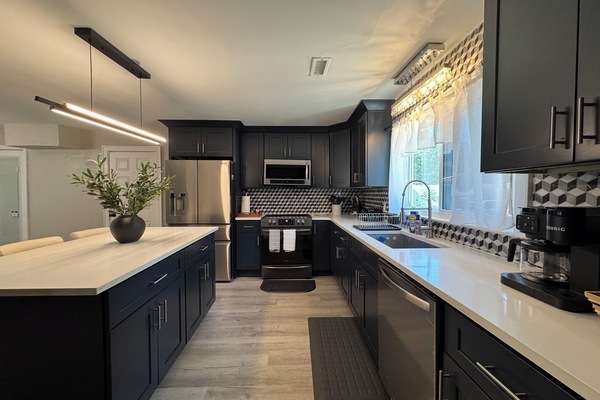 Spacious, fully equipped kitchen with a large island.