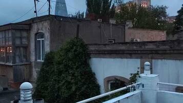 Chambre Triple Deluxe | Balcon