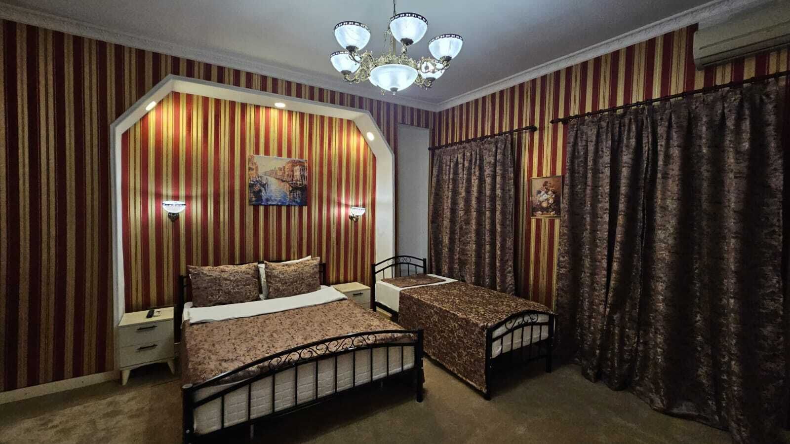 Superior Triple Room | In-room safe, desk, laptop workspace, blackout curtains