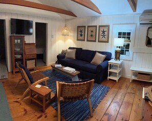 Living area - 2 Bedroom Waterview Cottage w/water activity access out your front door (Dennis)