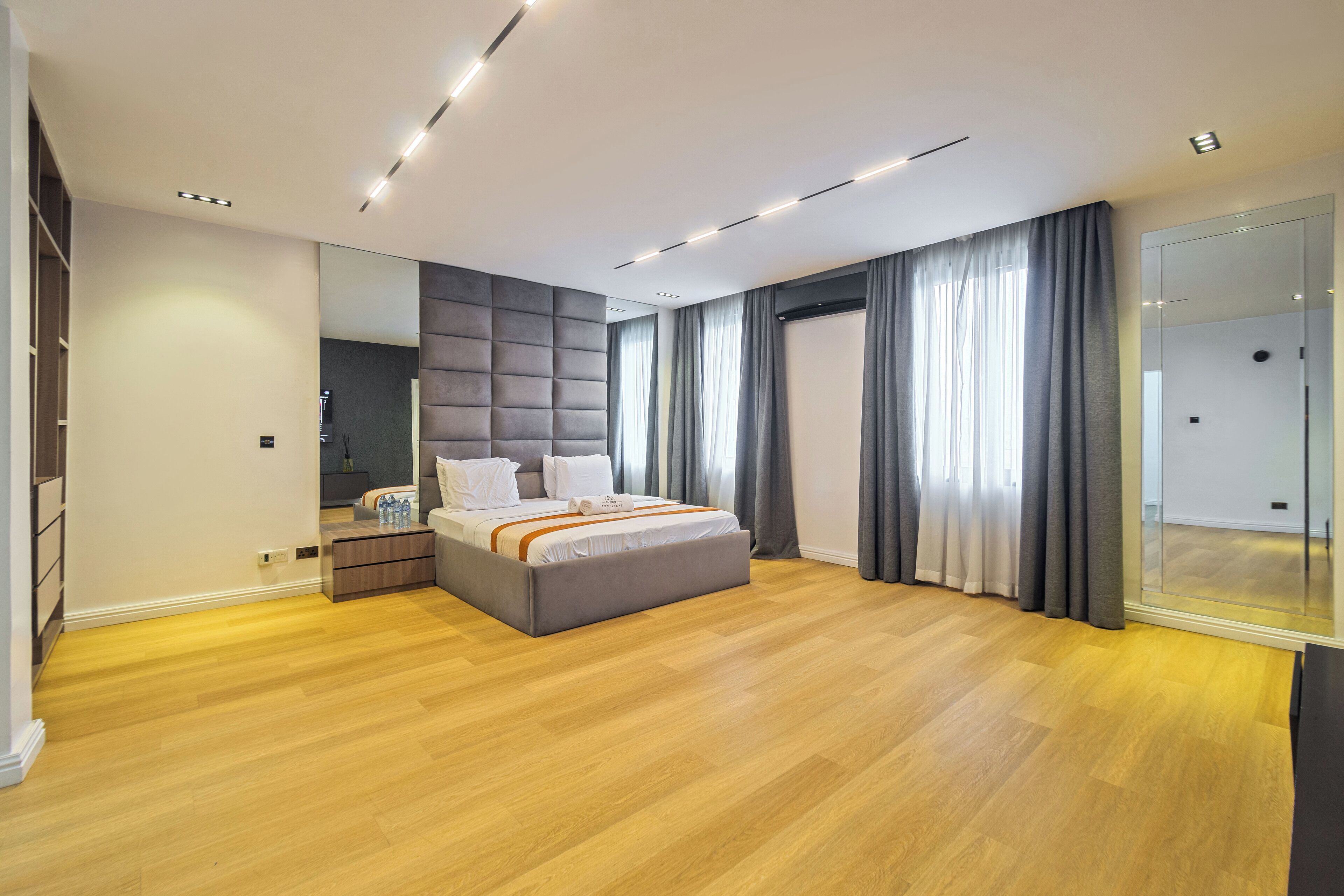 Luxury Apartment, Balcony, Garden View | In-room safe, desk, laptop workspace, iron/ironing board