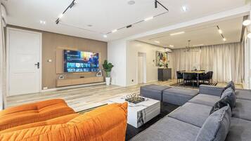 Luxury Apartment, City View | Living area