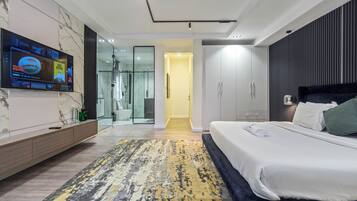 Luxury Apartment, City View | In-room safe, desk, laptop workspace, iron/ironing board