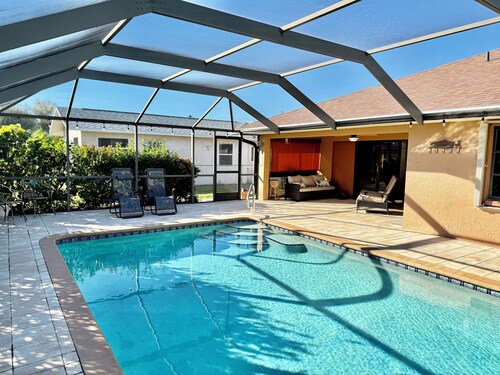 Tropical Southern Exposure Heated Pool Home in the Heart of Cape Coral
