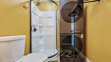 Shower, towels, soap, toilet paper