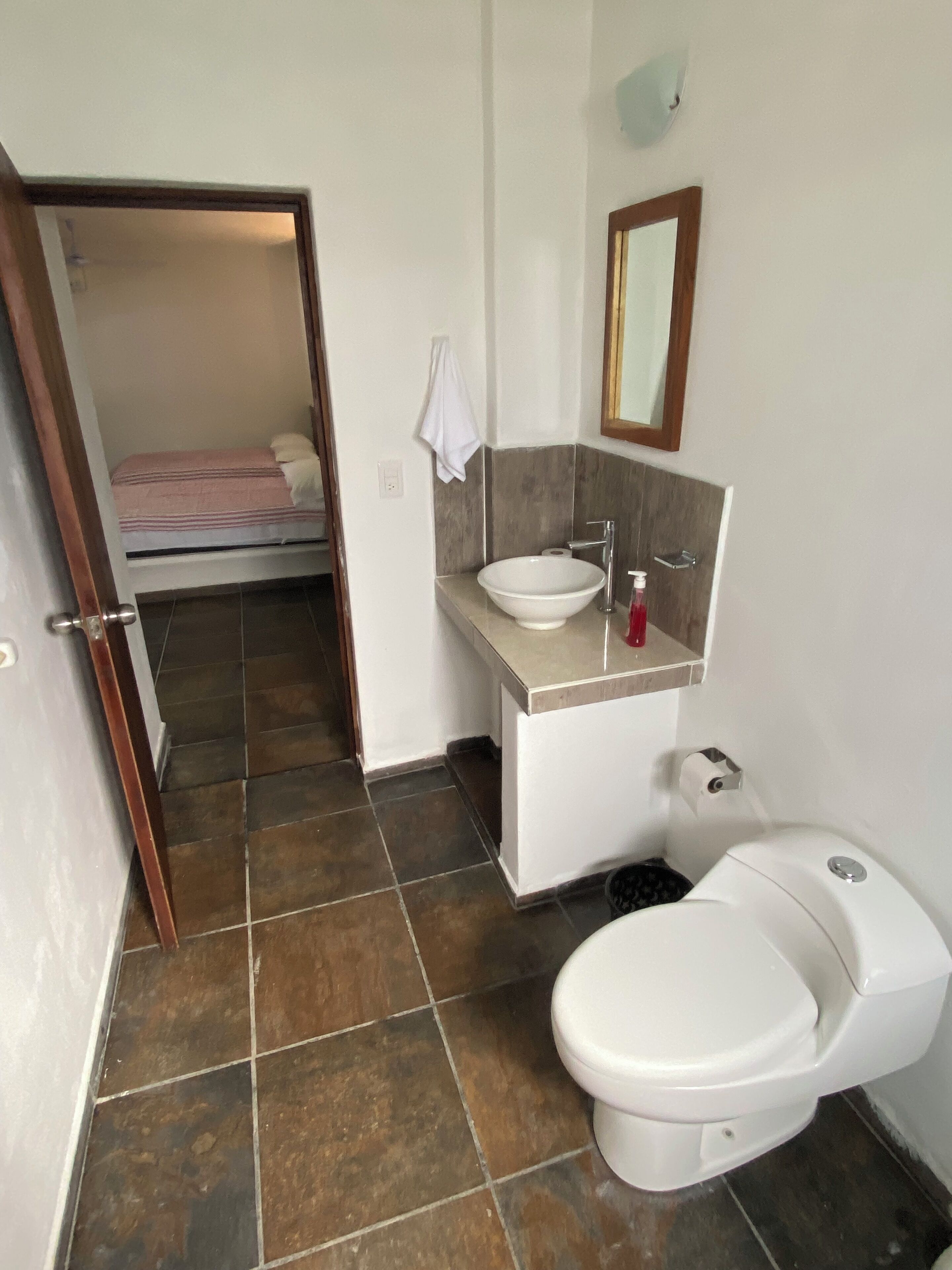 Shower, towels, soap, toilet paper