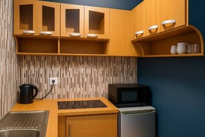 Appartement Confort, balcon, vue ville | Cuisine privée