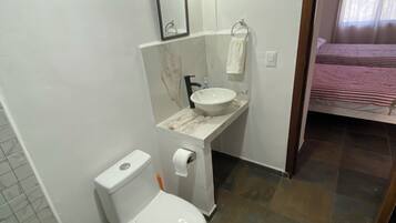 Shower, towels, soap, toilet paper