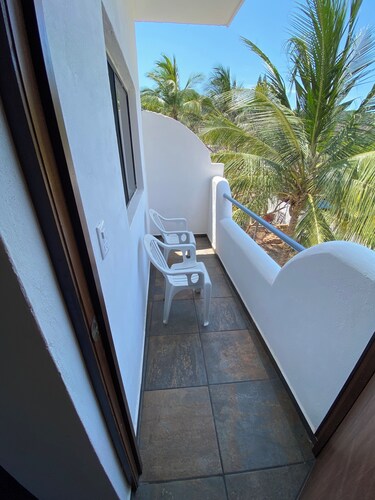 Very comfortable suite with 2 dbl beds, terrace and AC. Only 2 blocks from beach