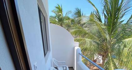 Very comfortable suite with 2 dbl beds, terrace and AC. Only 2 blocks from beach