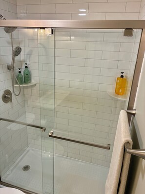 Shower, hair dryer, towels, soap