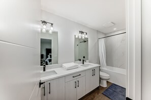 Hair dryer, towels, soap, toilet paper