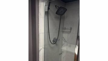 Shower, towels, toilet paper