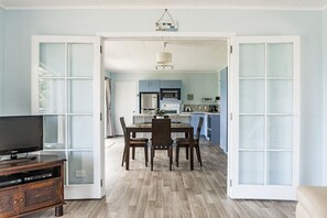 Dining - Calypso Cottage • Bright Bach + Water View (Raglan)