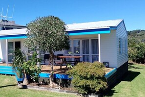 Outdoor dining - Calypso Cottage • Bright Bach + Water View (Raglan)