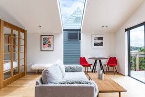 Living area - Studio Puriri • Vibrant • Artistic Studio (Raglan)