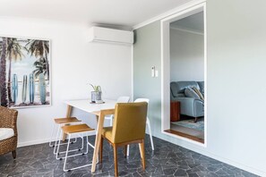 Dining - Kotare Cottage • Spa Pool • Walk to Town (Raglan)
