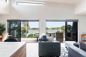 TV, fireplace - Okiwi Landing • Stylish • Central (Raglan)