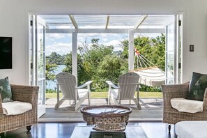 TV, fireplace - Mara Kai Retreat • Waterfront Peaceful Retreat (Raglan)