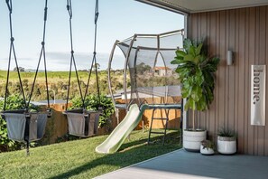 Children’s area - Hillside Haven • Design-led Beach Escape (Raglan)