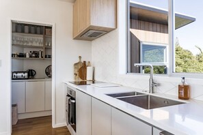 Fridge, microwave, oven, stovetop - Government House • Spa • Comfort • Views (Raglan)